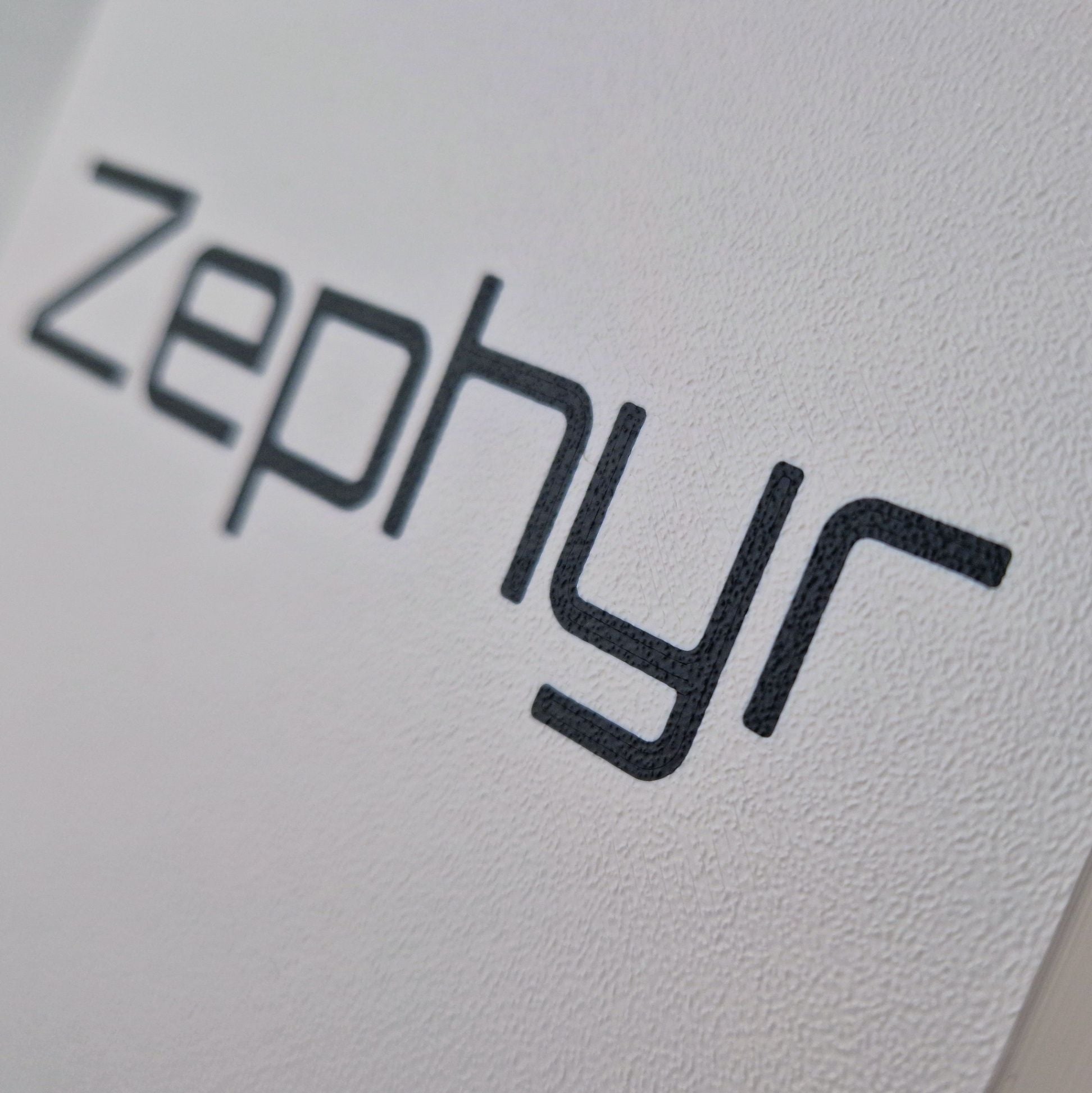 A personalized boat name engraved on a boat cover.