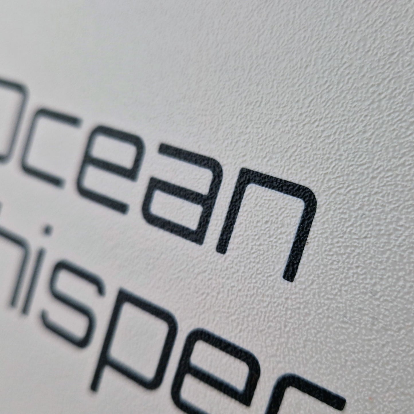 Personalised boat name emblazoned on a protective marine instrument cover