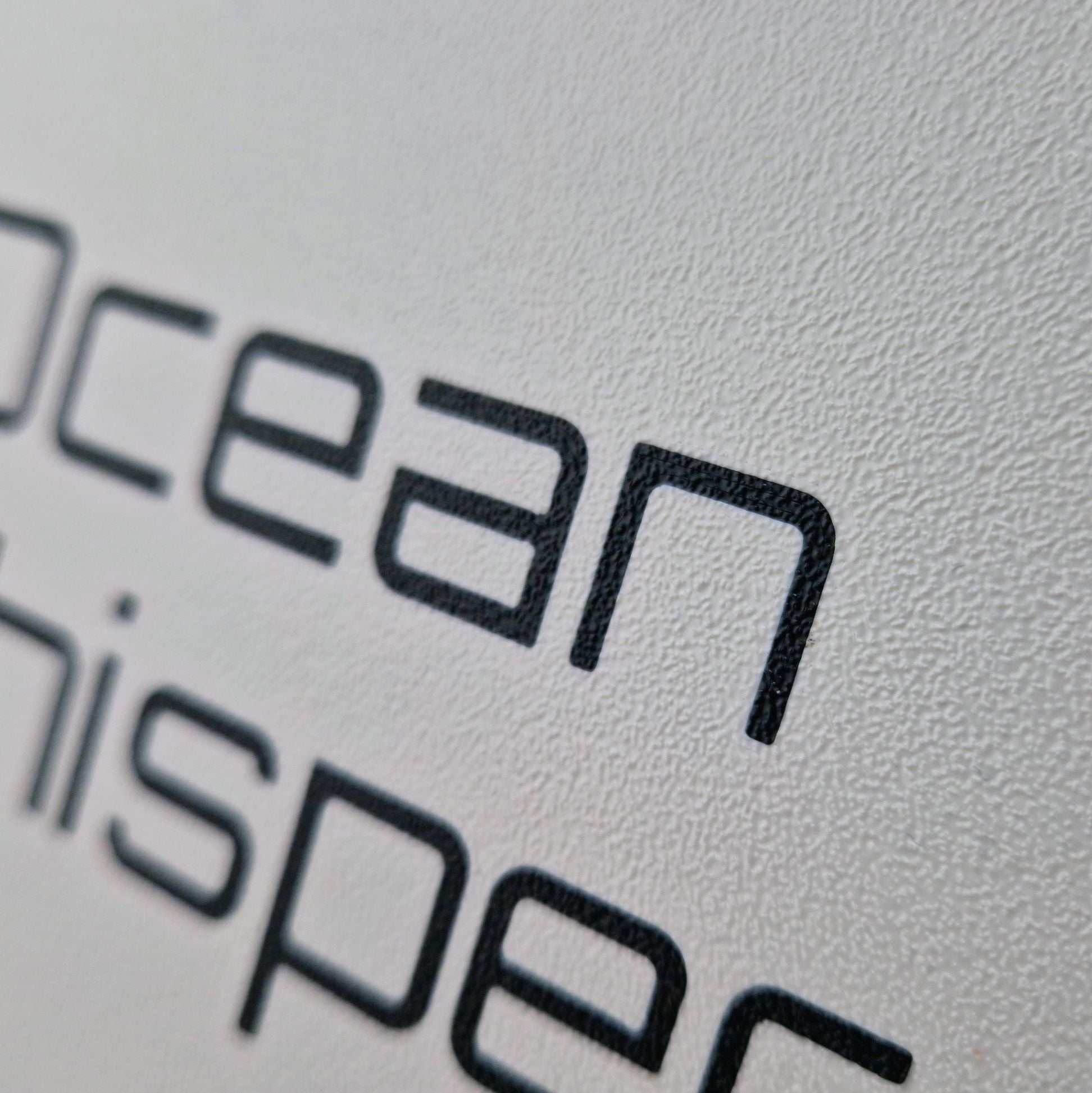 Personalised boat name emblazoned on a protective marine instrument cover
