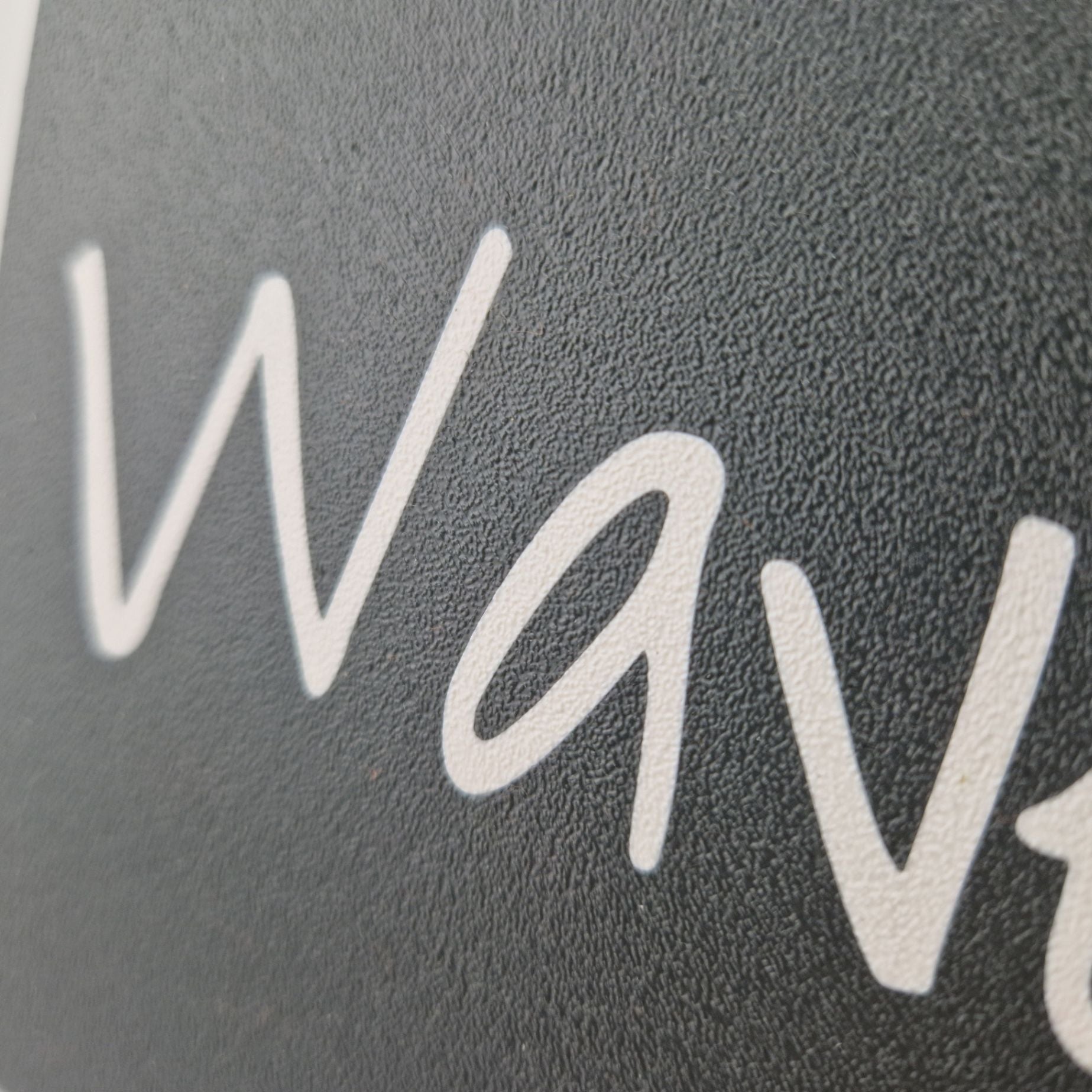 Boat name engraved in white on a cover