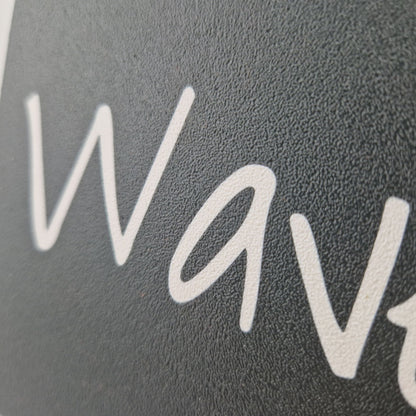 Boat name engraved in white on a cover