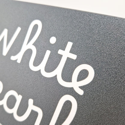 Personalised engraving of a boat name on a suncover