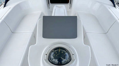 Sailboat deck with a Raymarine ST7002 autopilot control unit.